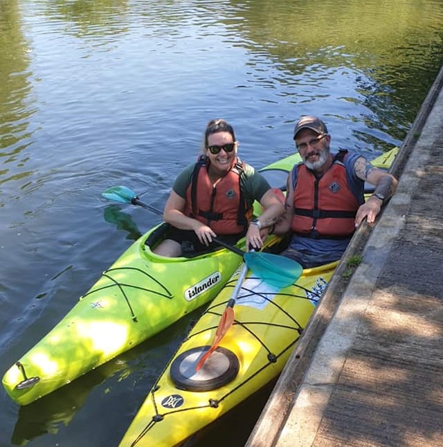 Couple in yellow kayaks at Kempston river